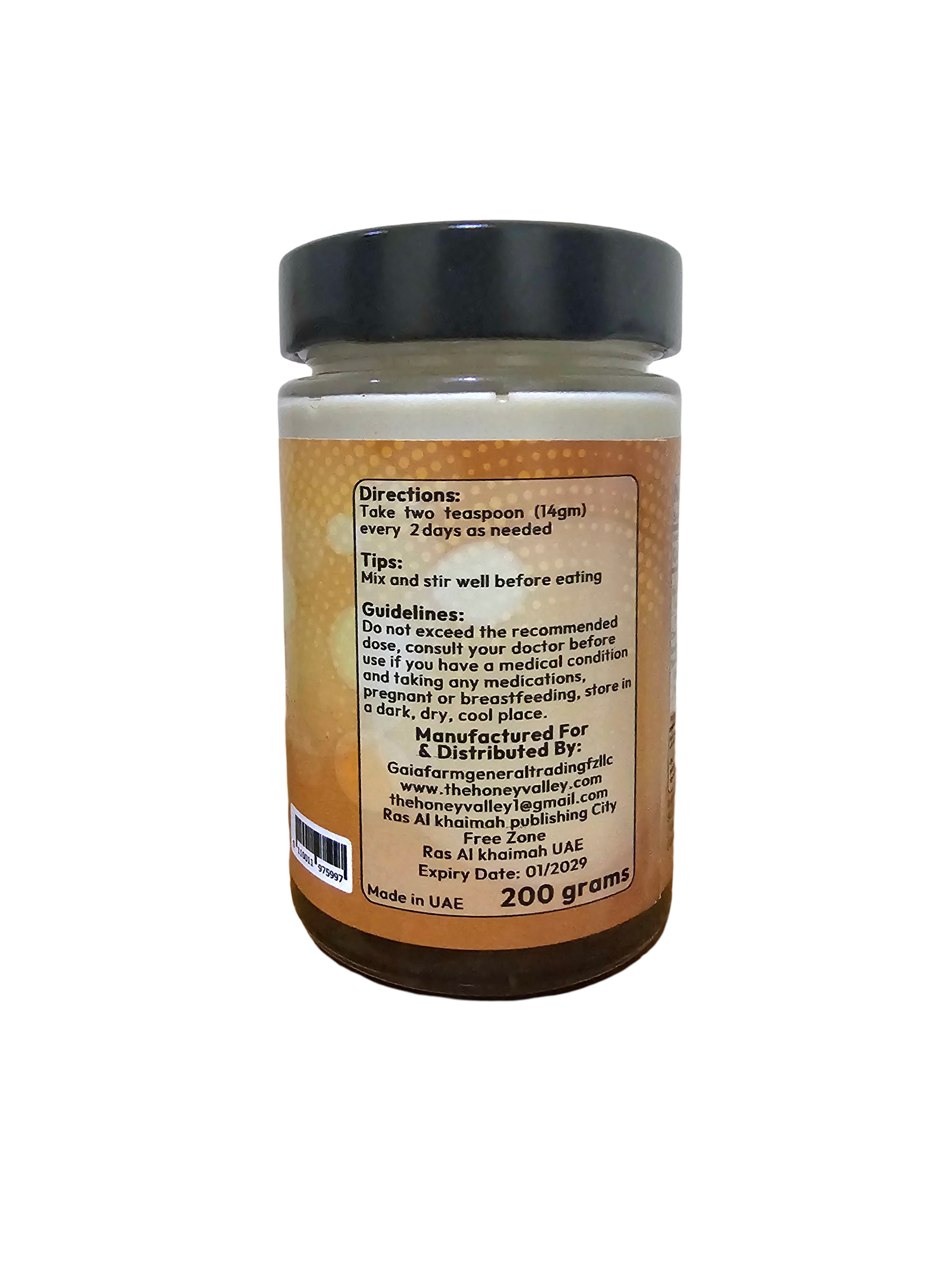 Spoonful of Herbal Power Honey ready to be consumed for natural vitality